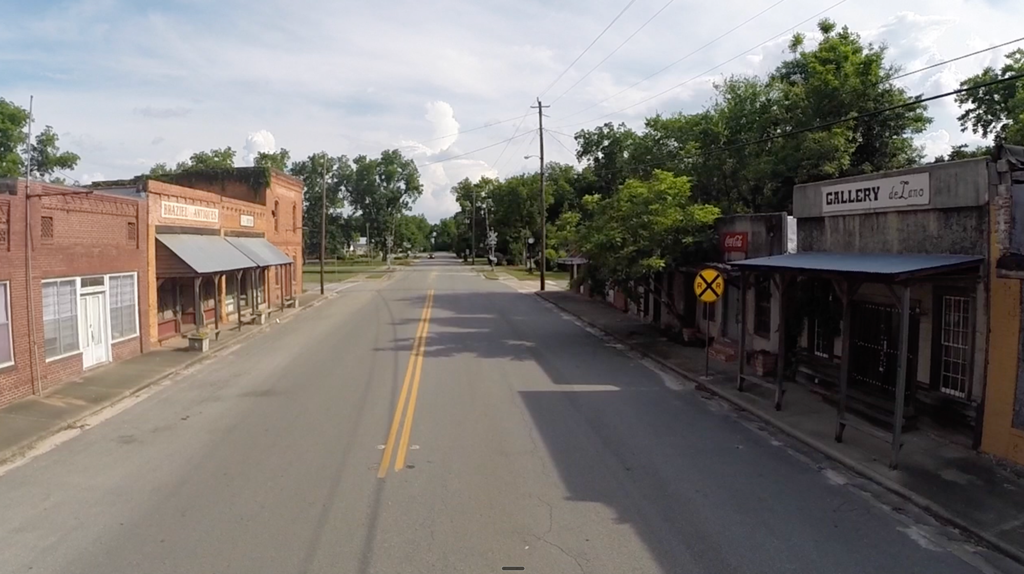 8th Street in Pitts, Georgia - Braziel's Antiques, Gallery deLano, and historic storefronts